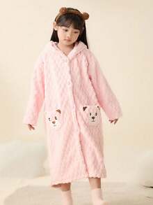 一件可爱儿童连帽浴袍，采用柔软珊瑚绒面料，保暖舒适，男女童皆宜，不掉毛，吸水性强，速干，可机洗，适用于浴室、卧室、酒店、游泳池等场所，也是节日礼物、生日礼物、浴巾、可穿戴毛巾、浴袍、浴室装饰、浴室配件和情人节礼物的理想之选。