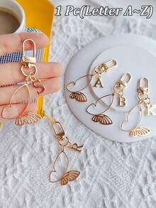 Elegant Alloy Butterfly And 26 English Letters Gold Keychain, A-Z Letters Fashionable Hollow Butterfly Design, Exquisite Bag Pendant, Pendant, Suitable For Bag Pendant Car Accessories, Perfect Women'S Daily Wear And Friends' Birthday Gifts, Daily Necessities, Perfect Holidays, Birthdays, Thanksgiving, Christmas Gifts