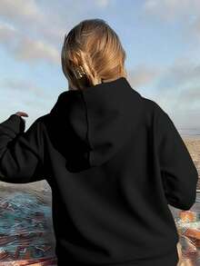 Sudadera con capucha amplia y bolsillo frontal tipo canguro. - Negro - Ver 2