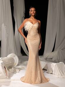 Faeriesty Đầm dạ hội đuôi cá không dây vai đính sequin, thiết kế thắt dây lưng và điểm nhấn lông vũ, lý tưởng cho các sự kiện thảm đỏ, tiệc tối trang trọng, trang phục dự đám cưới, dạ tiệc từ thiện và các buổi tiệc sang trọng. - Rượu sâm banh - Xem 5