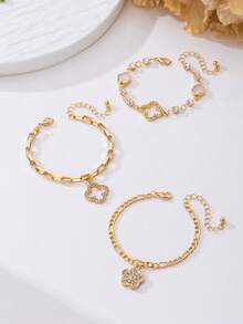 Set de 3 piezas de pulsera con colgante de trébol hueco de lujo con rhinestones, joyería elegante para mujeres