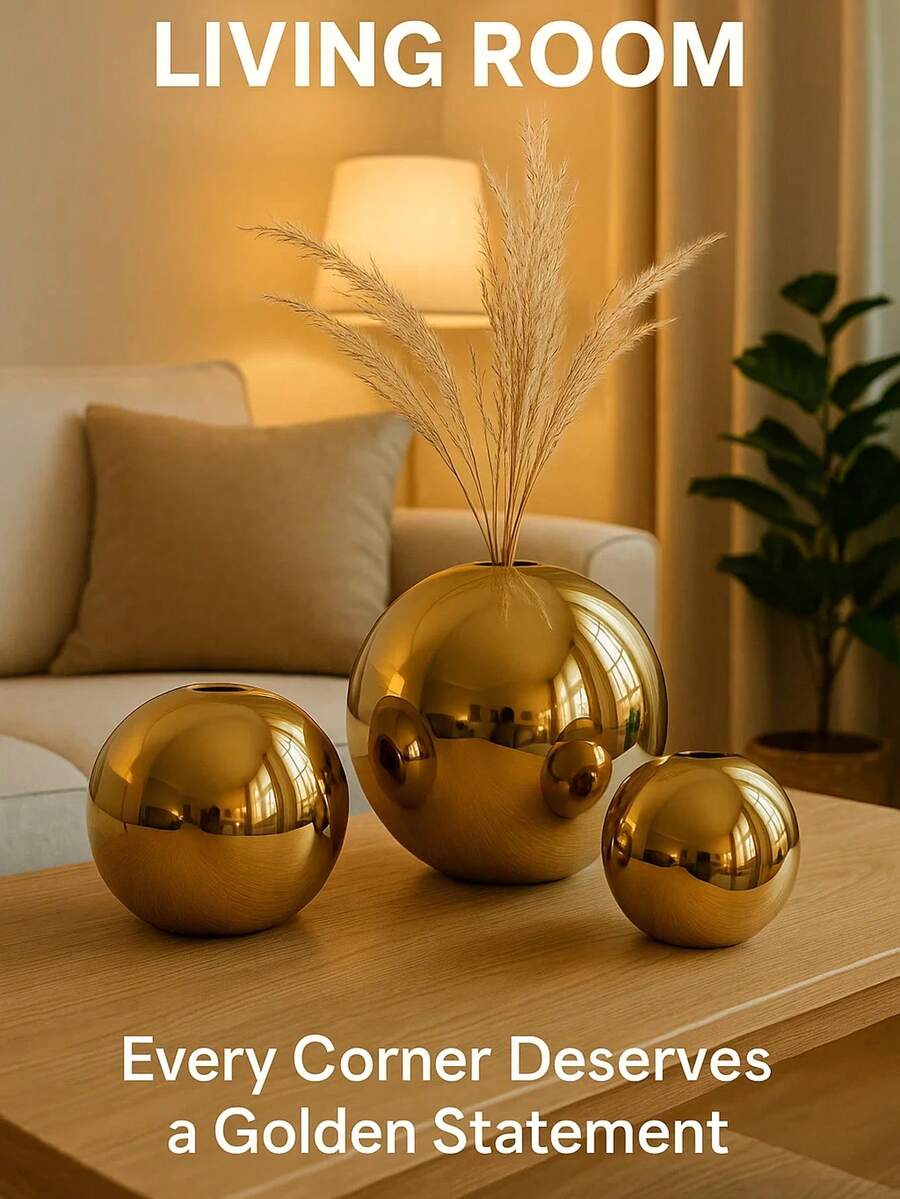 这款优雅闪亮的金色球形花瓶是家居装饰的理想之选，非常适合摆放干花和鲜花，为任何房间增添时尚气息。它也是装饰客厅、卧室、办公室或花园的完美选择，同时也是一份精美的礼物或装饰品。其现代美学设计能够提升室内设计格调。 - 彩色 - 查看 1
