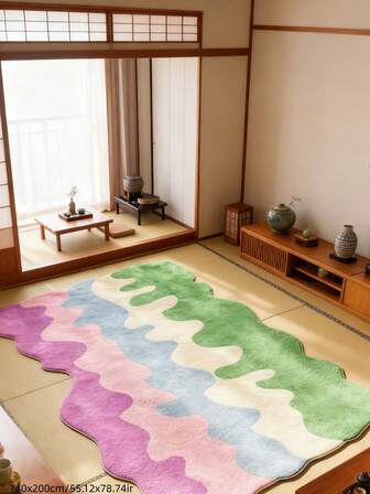 1 块波浪形彩色条纹地毯，不对称波浪设计，搭配柔和的粉色、梦幻的紫色、清新的蓝色、明亮的绿色和温暖的米色，如同流动的彩虹，为家居空间注入艺术气息，柔软亲肤的材质，适用于客厅和卧室圣诞装饰