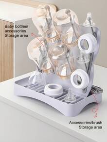 1 Escurridor multifuncional desmontable Material: PP Ligero y portátil Escurridor de tazas Utilizado para escurrir botellas/tazas/platos/vajilla y palillos, etc. Adecuado para el hogar/cocina/baño/habitación del bebé/oficina Estilo moderno y sencillo Diseño de base desmontable Incluye un cepillo desmontable para botellas Fácil de limpiar Fácil de almacenar Incluye ganchos y bandeja También se puede usar como tablero de almacenamiento de escritorio