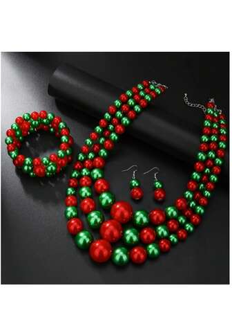 1 套圣诞主题珠宝，包括 1 对耳环、1 条手链、1 条人造珍珠粗项链（红色和绿色），适合圣诞节佩戴和送礼