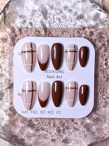 10片手工法式美甲贴纸，包含绿色、白色、紫色、棕色、金色、黄色、红色、猫眼、波点等多种款式，可爱俏皮。每片贴纸均采用手工打造的3D三瓣花和十字纹设计，并饰以金色珠子和爱心图案。套装包含美甲工具。适合学校、工作等各种场合，打造杏仁形美甲。 - 棕色 - 查看 5