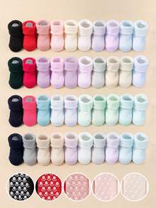 12/6/1 Paar Baby Socken mit zufälligen Farben, Grip, verstärkt für Herbst und Winter, geeignet für Kleinkinder. Es sind mehrere Farben erhältlich, entworfen mit kleinen Fußabdruck-Mustern und Klebepunkten. Baby Socken, Neugeborenen Socken, Kleinkind Socken, Säuglings Socken.