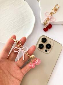 1 pieza Nuevo llavero de mujer con lazo de cereza de metal, accesorio de lazo de moda, colgante minimalista de estilo Ins para bolsa, regalo de vuelta al colegio
