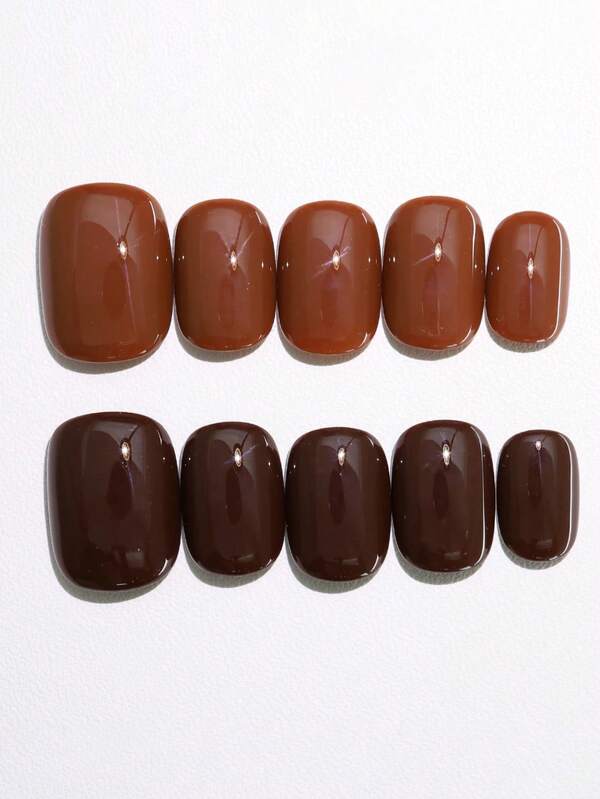 10 pezzi di unghie finte corte di forma ovale, realizzate a mano, di stile retrò dolce e cool, minimaliste e di alta gamma, con blocchi di colore nero e marrone, colore solido elegante e lucido, unghie finte personalizzate e alla moda per donne e ragazze, adatte per feste autunnali e invernali, e per uso quotidiano