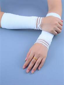 1 paire de manchettes sans doigts décoratives en dentelle tricotée élastique à la mode, convient comme accessoire vestimentaire pour femmes et filles