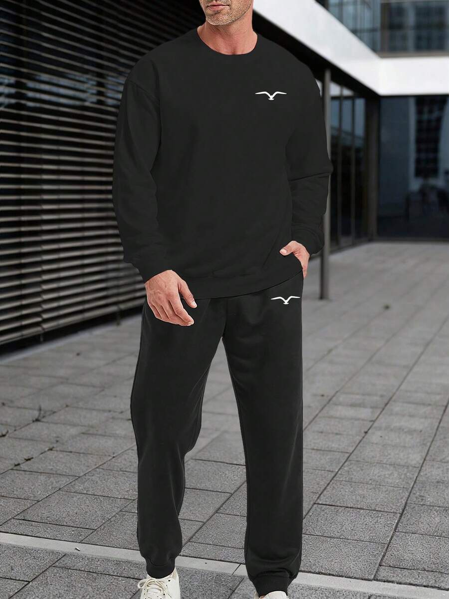 2 件秋季男士运动衫和运动裤套装，黑色长袖圆领休闲上衣，针织松紧腰带黑色慢跑裤，字母图案印花