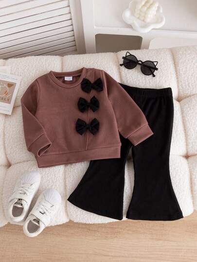 2pcs Infant Girl Casual Cute Brown Long Sleeve Crew Neck Sweatshirt With Black Bow Decor, Paired With Black Flare Pants Outfit, Suitable For Daily, Outdoor, Commute, School, Holiday, Party