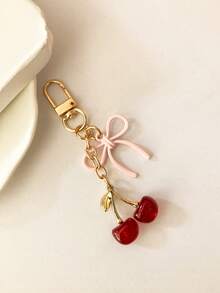 1 pieza Nuevo llavero de mujer con lazo de cereza de metal, accesorio de lazo de moda, colgante minimalista de estilo Ins para bolsa, regalo de vuelta al colegio