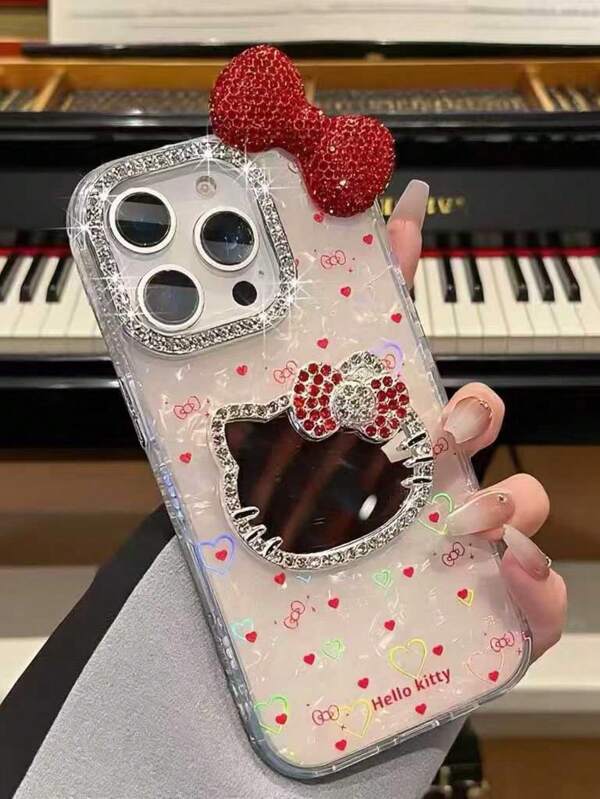 Sanrio Laser-Etched Heart-Shaped Shell Pattern With Large-Hole Rhinestone Frame And Rhinestone Bow Kitty Cat Phone Case Compatible With Apple 17Air/17/17Pro/17ProMax/16/15/11/12/13/14 Pro Max/11 Pro/11 Pro Max/12 Pro/12 Pro Max/13 Pro/13 Pro Max//14 Pro/14 Pro Max/14 Plus