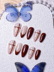 10片手工法式美甲贴纸，包含绿色、白色、紫色、棕色、金色、黄色、红色、猫眼、波点等多种款式，可爱俏皮。每片贴纸均采用手工打造的3D三瓣花和十字纹设计，并饰以金色珠子和爱心图案。套装包含美甲工具。适合学校、工作等各种场合，打造杏仁形美甲。 - 棕色 - 查看 3