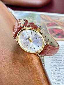 Nuevo reloj de señora ovalado dorado - Estilo coreano, simple, elegante, casual, versátil, de lujo ligero, reloj de pulsera de cuarzo de nicho con correa de cuero