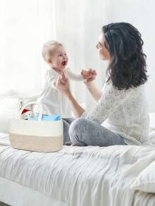 50片一次性透气防漏吸水婴儿尿布垫，可折叠便携，适合外出妈妈 - 彩色 - 查看 4