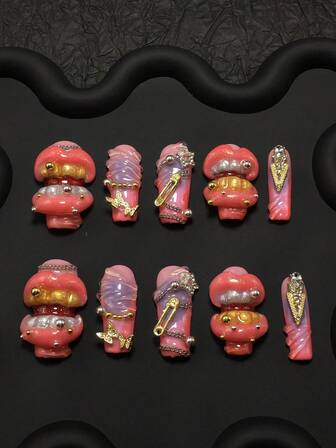 10-Piece Sweet And Edgy Pipe-Shaped Fake Nail Set - Handmade This Is A Handmade 10-Piece Pipe-Shaped Fake Nail Set With A Sweet And Edgy Style. It Integrates Decorations Such As Three-Dimensional Red Lips, Metal Butterflies, Black Bows, Rivets, And Dollar Signs. Featuring Pink And Orange Tones, The Style Combines Sweetness, Edginess, And Artistry, Presenting A Strong Visual Contrast.