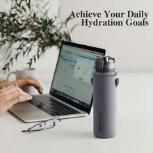 Unistar Water Bottle With Time Marker -Large 34 Oz Tritan Bottle & No Sweat Sleeve -Leak Proof Gym Sports Bottle With Fruit Infuser Strainer & Carrying Strap - Gift Package For Christmas - Xám - Xem 2