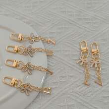 1pc White Exquisite Bow Tie Capital A-Z Letter Keychain Pendant Suitable For Bags, Backpacks, Car Key Pendants, Graduation Season, School Season, Small Gifts For Each Other, Suitable For Handbags, Backpacks, Keys,