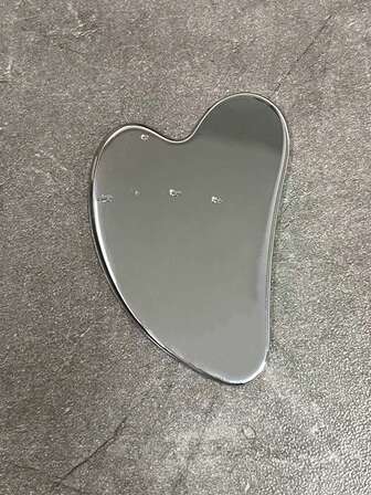 1 st hjärtformat Gua Sha-verktyg i rostfritt stål för ansikts- och kroppsmassage, bärbar muskelavslappning, minskar svullnader och stramar upp huden, robust och slät metall Gua Sha för ansiktsmassage, nacke, ögon och kropp, miniutgåva, hudvårdsverktyg