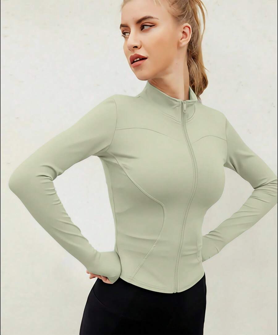 Chaqueta deportiva de manga larga con cremallera de color liso para mujer, corte ajustado y puños con abertura para el pulgar, ideal para fitness, yoga y running. - Verde - Ver 1