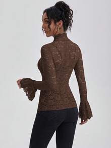 Blusa elegante y sexy de unicolor y transparente con mangas acampanadas de encaje, adecuada para invierno, Navidad y Año Nuevo