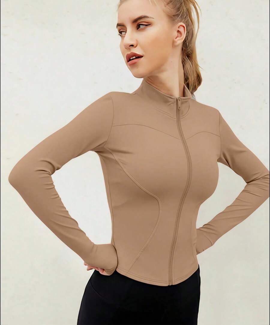 Chaqueta deportiva de manga larga con cremallera de color liso para mujer, corte ajustado y puños con abertura para el pulgar, ideal para fitness, yoga y running. - Albaricoque - Ver 1