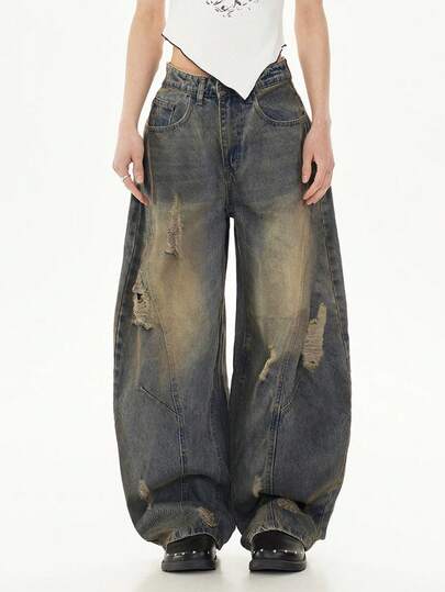 1 chiếc quần jeans ống rộng kiểu vintage rách rưới, phối nhiều mảnh vải, phong cách hiphop thoải mái dành cho nam giới.