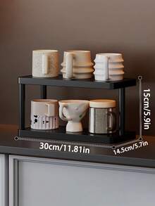 Modern Black Three-Tier Storage Rack, Multi-Level Shelving - Freestanding Tiered Shelf Unit, Black Frame, Ideal For Kitchen, Bathroom, Bedroom - Space-Saving Home Decor Storage Rack, Minimalist Design, Durable And Easy To Clean, Multifunctional Compact Storage Solution Combining Aesthetics And Utility. Ideal For Displaying Books, Cups, And Small Items.