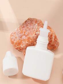 2 piezas Botellas exprimibles de pegamento para uñas y pestañas