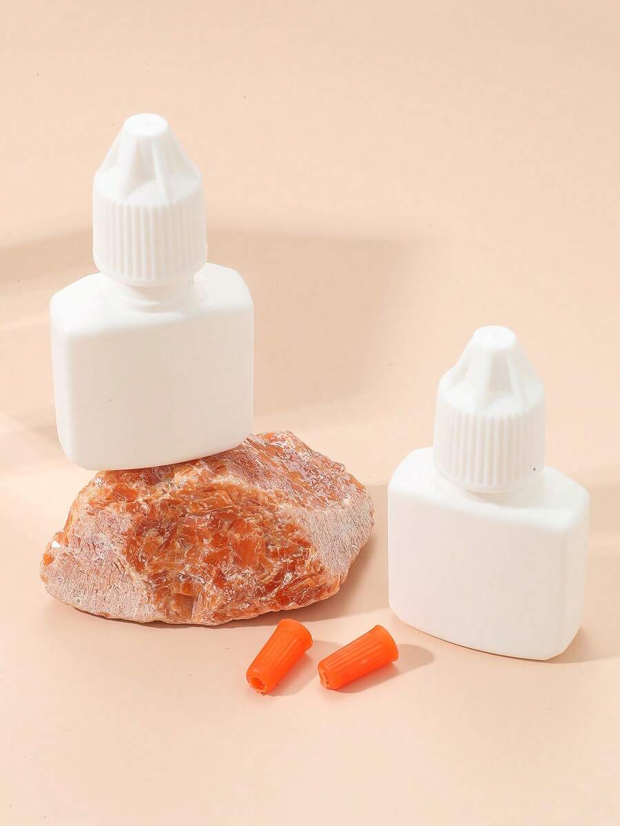 2 piezas Botellas exprimibles de pegamento para uñas y pestañas