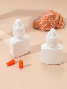 2 piezas Botellas exprimibles de pegamento para uñas y pestañas