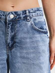 Jeans anchos de mezclilla azul casual con rasgados, bolsillos y cremallera, de tela sin estiramiento para mujeres