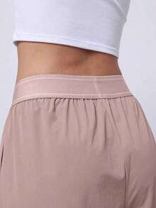 Quần chạy bộ nữ nhẹ, co giãn cao - Quần thể thao nhanh khô, thoải mái với túi khóa kéo. Quần thể thao rộng rãi, co giãn cao, thoáng khí và nhanh khô, phù hợp cho chạy bộ, leo núi, tập thể dục và các hoạt động khác. Kiểu dáng thoải mái, được làm từ vải mềm cao cấp, dễ chịu và thoáng khí, với độ co giãn tuyệt vời, hoàn hảo cho nhiều hoạt động thể thao khác nhau. Màu hồng xuân - Hồng - Xem 2