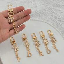 1pc White Exquisite Bow Tie Capital A-Z Letter Keychain Pendant Suitable For Bags, Backpacks, Car Key Pendants, Graduation Season, School Season, Small Gifts For Each Other, Suitable For Handbags, Backpacks, Keys,