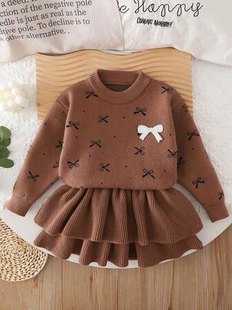 Conjunto de suéter grueso de punto para niñas con blusa con lazo y falda de cintura alta tipo pastel, conjunto de alta calidad de punto para niñas
