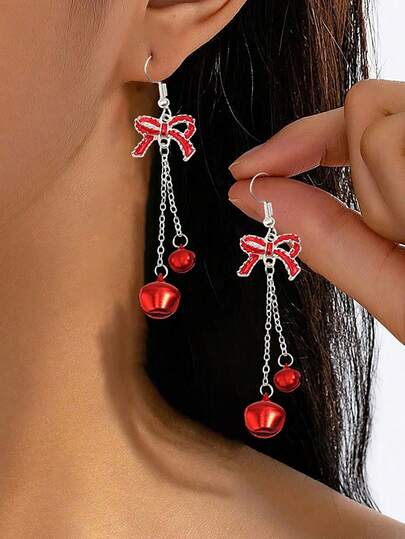 1 Paar modische Cartoon Weihnachtsstil Metall Schleife Glocke Hänge Ohrringe, geeignet für Frauen zum Tragen an Weihnachten