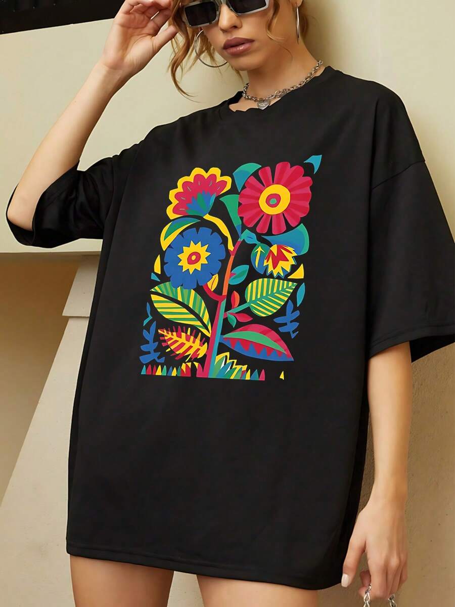 Camiseta de mujer con estampado floral vibrante, elegante camiseta de cuello redondo con patrón floral abstracto colorido, perfecta para ropa informal, tela suave y cómoda, encantadora camiseta con patrón botánico, adecuada para mujeres de gran tamaño. - Negro - Ver 1