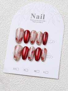 一套10款椭圆形金边红色渐变花卉全覆盖美甲图案，时尚精致，轻松打造美甲造型。为时尚女孩的指尖增添浪漫气息，巧妙展现大胆的时尚风格。非常适合派对、舞会和日常穿着。是送给女士和女孩的绝佳礼物。
