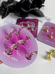 Decoraciones de arte de uñas, cruzada de alta demanda de mariposas, corazones y formas geométricas de colores con base metálica magnética, soporte de exhibición de arte de uñas coreano, accesorios de fotografía, manualidades DIY