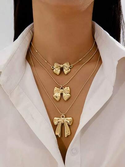 Collar en Y con lazo metálico dorado simple, versátil y de moda para mujeres