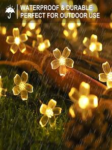 Cordão de luzes de Natal solares, 20/50/100 LEDs, luzes solares de cerejeira, à prova d'água para pátio externo, luzes solares em formato de flor com 8 modos de iluminação, luzes de fada solares para jardim, quintal, varanda, casamento, festa, camping, decoração de árvore de Natal, luzes de decoração de Halloween e Natal. - Preto - Ver 15