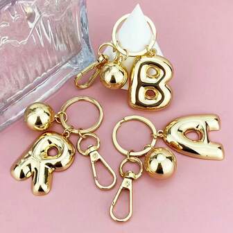 1个A-Z 26个英文字母钥匙扣，泡泡字母钥匙圈，可挂在包包、汽车上，是送给父母和朋友的礼物，也是包包挂饰、汽车配件、老师、姐妹的理想礼物。