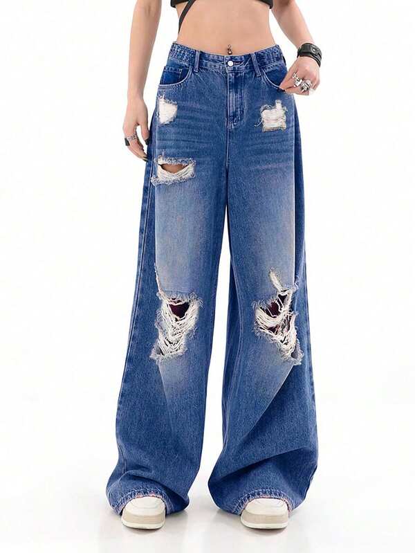 جينز نسائي فضفاض مرتخي مع جيوب وتصميم مبهت