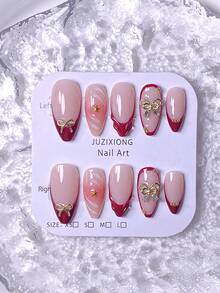 Conjunto com 10 adesivos de unhas postiças prensadas à mão, incluindo unhas curtas, unhas falsas, francesinhas, unhas amendoadas, unhas brancas, vermelhas, rosas, azuis, douradas, olho de gato, unhas fofas, unhas para o Dia dos Namorados e unhas para o Ano Novo. Decoradas com laço dourado e enfeites de floco de neve na superfície. Acompanha kit de aplicação, fácil de colocar e remover. Ideal para mulheres e meninas que gostam de unhas amendoadas. - Vermelho - Ver 4