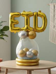 16件套开斋节派对装饰气球套装，包含16英寸金色“EID”字母铝箔气球、18英寸透明乳胶气球和金色金属卷曲气球，适用于开斋节和斋月。家居派对装饰道具 - 查看 3