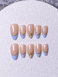 10pcs Handmade French Short Nail Stickers. This Nail Art Set Includes 5 Colors: White, Pink, Gold, Blue, And Yellow, With A Charming And Adorable Design. Each Nail Sticker Is Decorated With Hand-Painted Vine Patterns That Wind Along The Metallic-Feeling French Edges. Nails Nail Supplies Handmade Press On Nails - Blue - View 2
