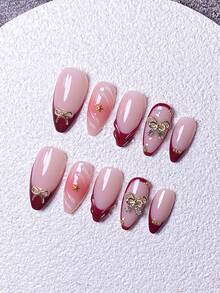 Conjunto com 10 adesivos de unhas postiças prensadas à mão, incluindo unhas curtas, unhas falsas, francesinhas, unhas amendoadas, unhas brancas, vermelhas, rosas, azuis, douradas, olho de gato, unhas fofas, unhas para o Dia dos Namorados e unhas para o Ano Novo. Decoradas com laço dourado e enfeites de floco de neve na superfície. Acompanha kit de aplicação, fácil de colocar e remover. Ideal para mulheres e meninas que gostam de unhas amendoadas. - Vermelho - Ver 3