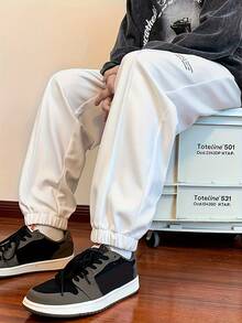 Men's Sports Fitness Casual Pants, Loose Version, Belt Adjustment, Suitable For Spring And Summer Outdoor Sports And Fitness - trắng - Xem 6